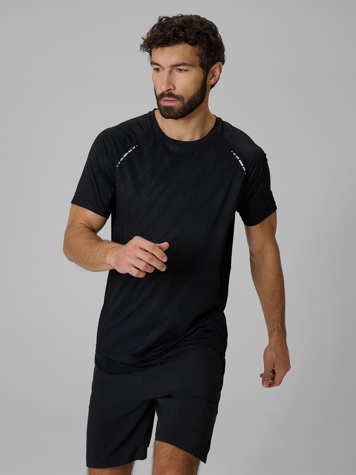 4F Koszulka do biegania szybkoschnąca męska - czarna XL