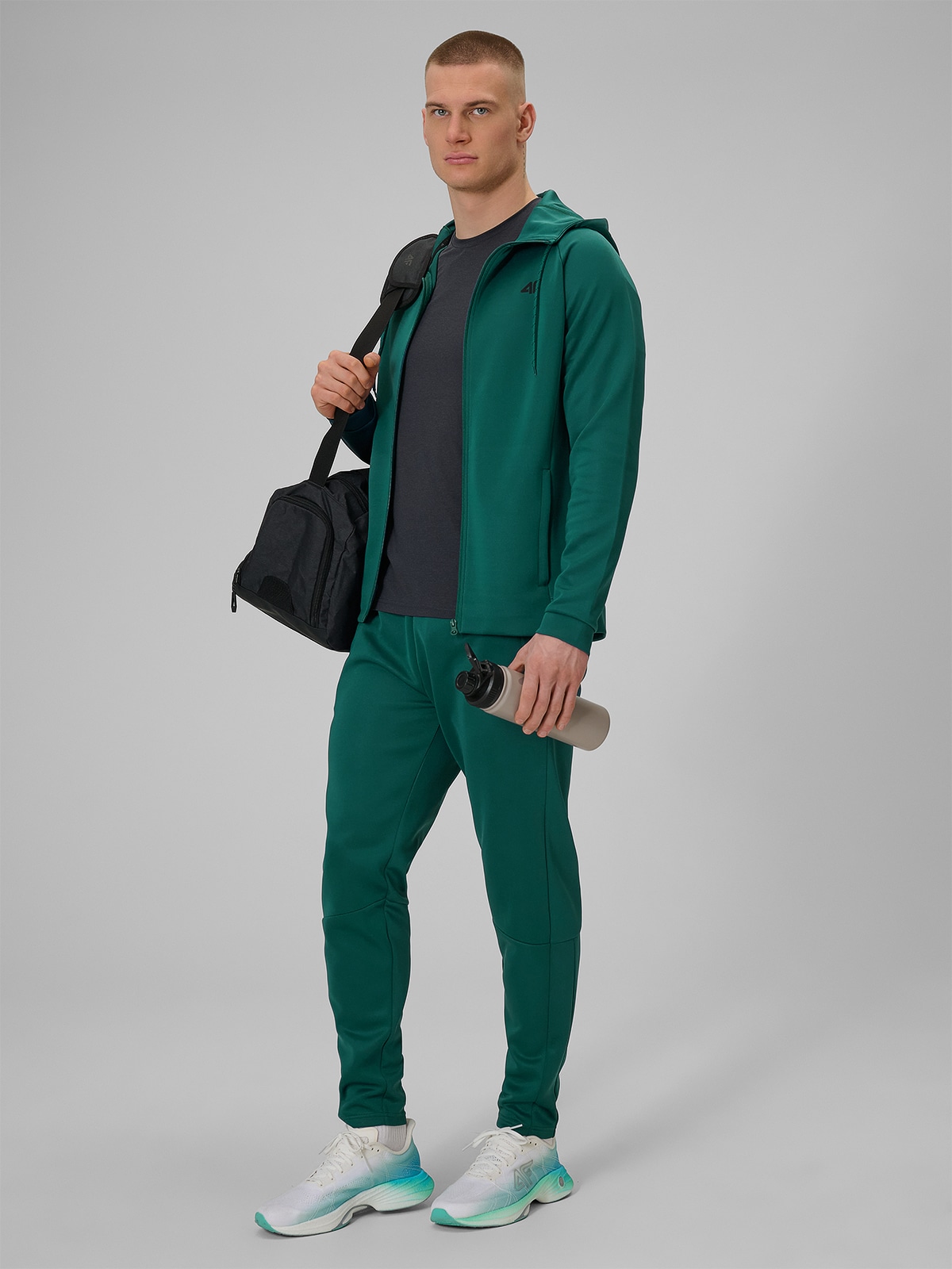 4F Spodnie treningowe szybkoschnące męskie - zielone XXL