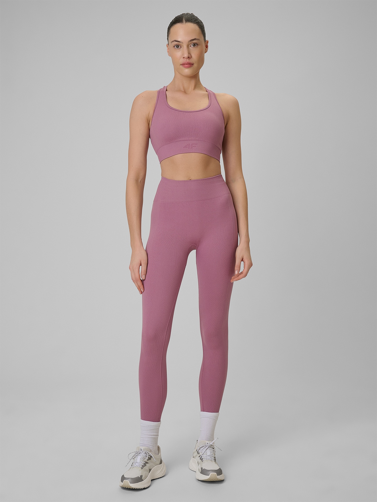 4F Legginsy treningowe bezszwowe damskie - różowe XS/S