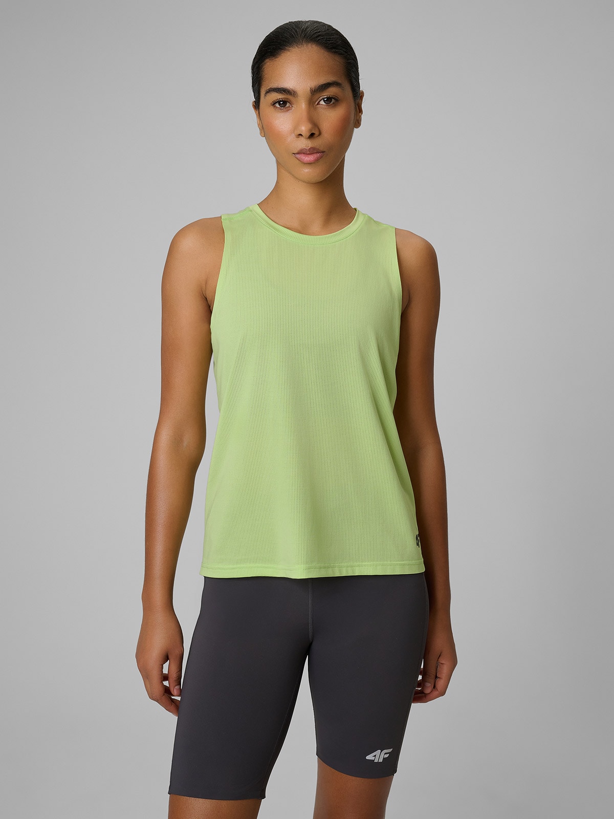 4F Koszulka do biegania regular szybkoschnąca damska - żółta XS