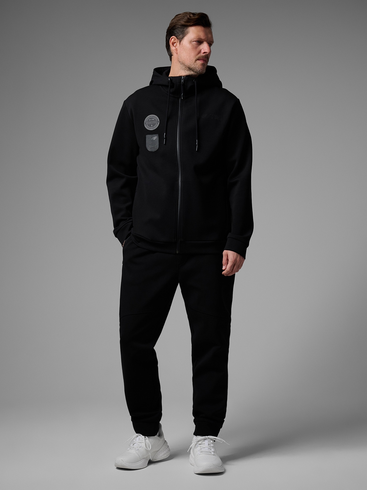 4F Spodnie dresowe joggery męskie 4F x Robert Lewandowski - czarne XXL