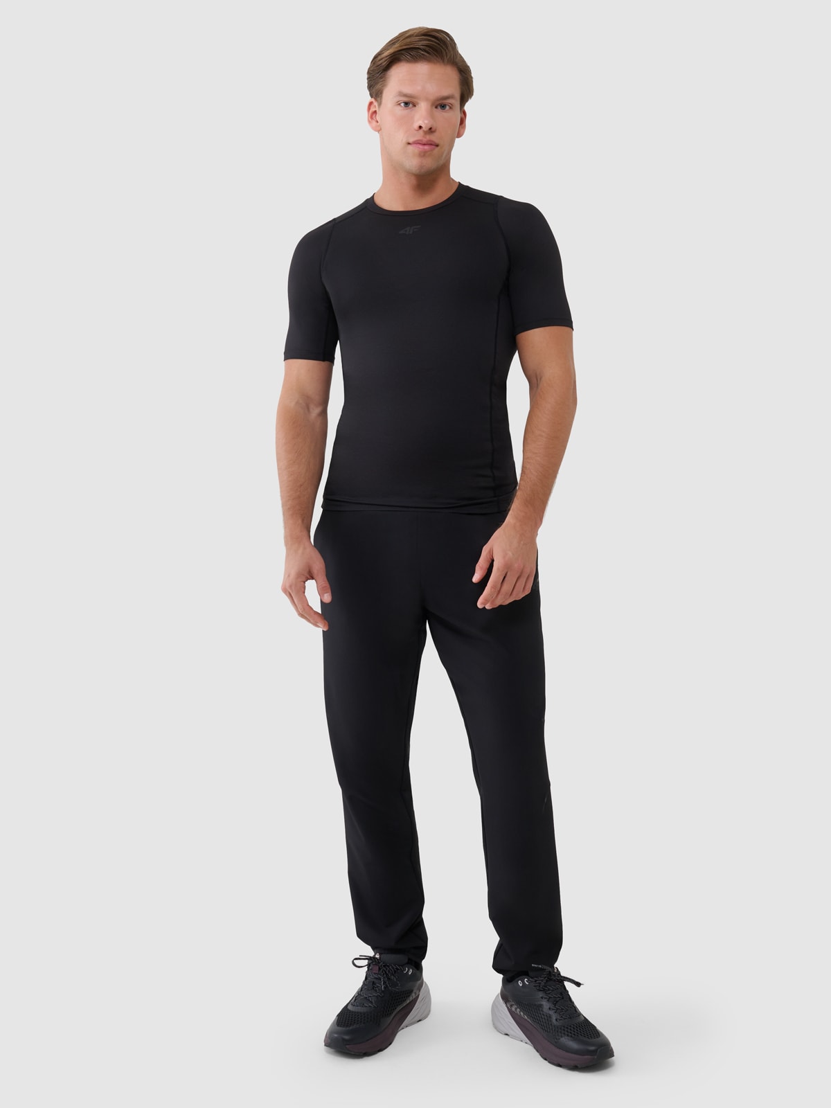 4F Spodnie treningowe szybkoschnące męskie - czarne L