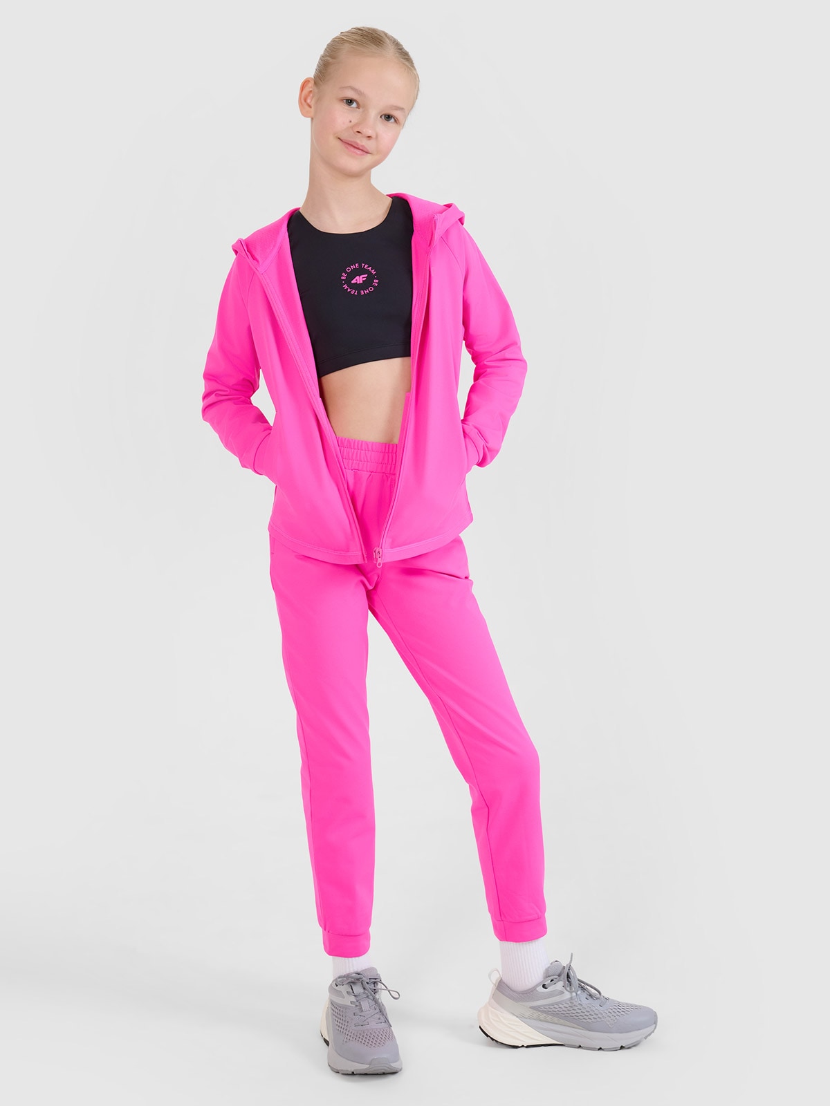 4F Spodnie sportowe szybkoschnące dziewczęce - różowe 134/140 (8-10 lat)