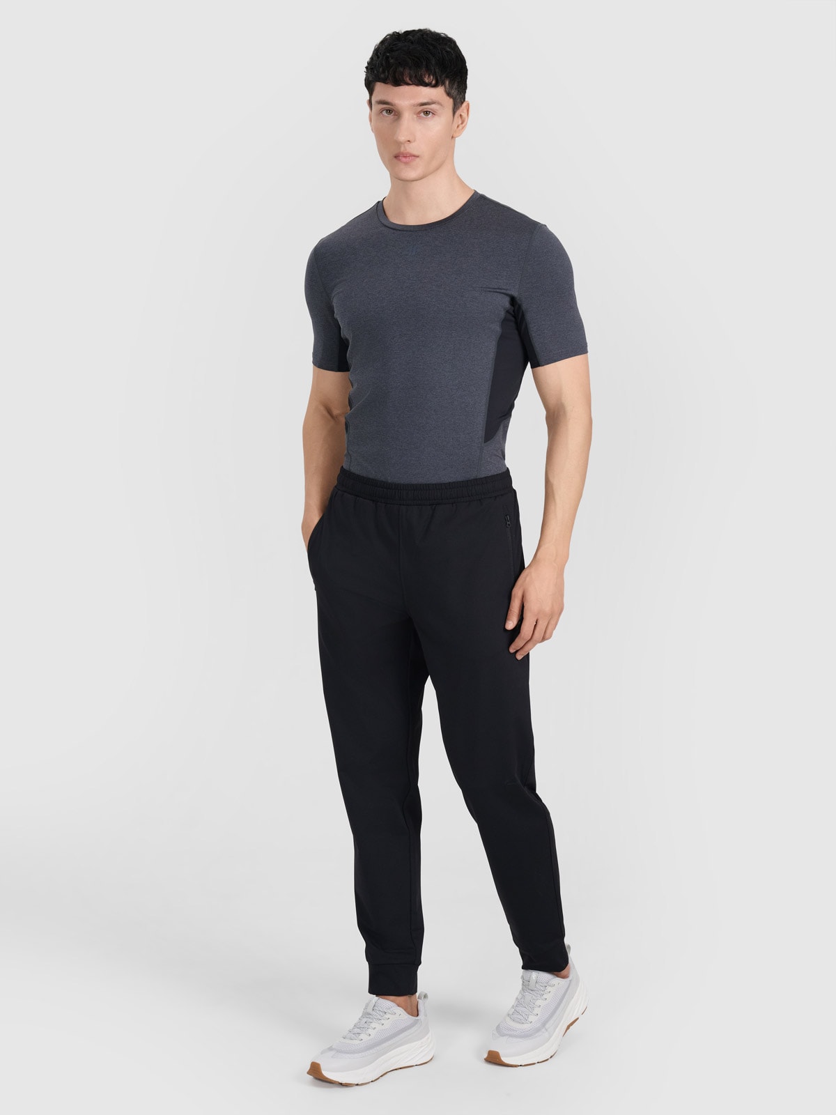 4F Spodnie treningowe szybkoschnące męskie - czarne S