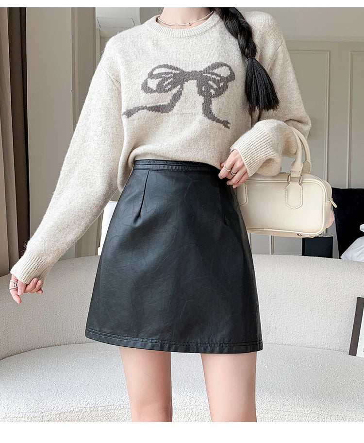 Klasyczna skórzana spódnica mini - Czarny S