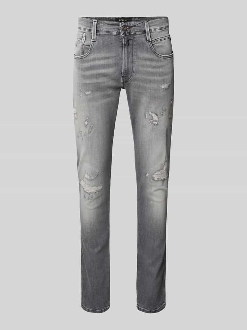Jeans o kroju slim fit z przetarciami model 'Anbass'