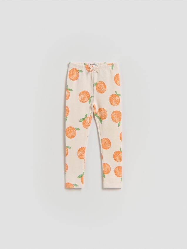 Reserved - Prążkowane legginsy - kremowy