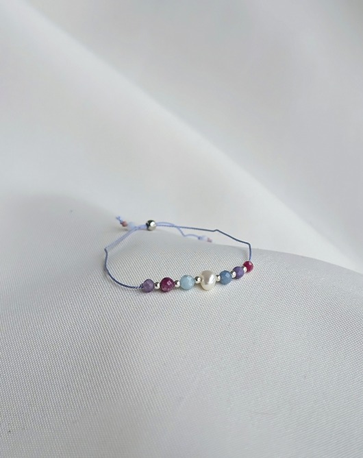 Kolorowa bransoletka z perłą