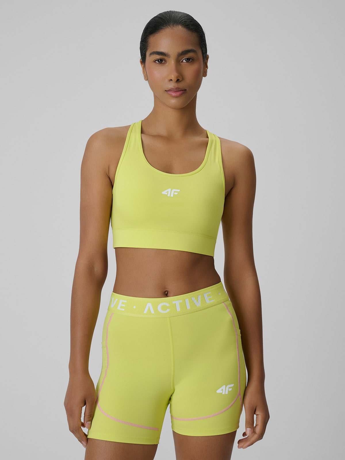 4F Biustonosz treningowy z niskim wsparciem damski - żółty XL