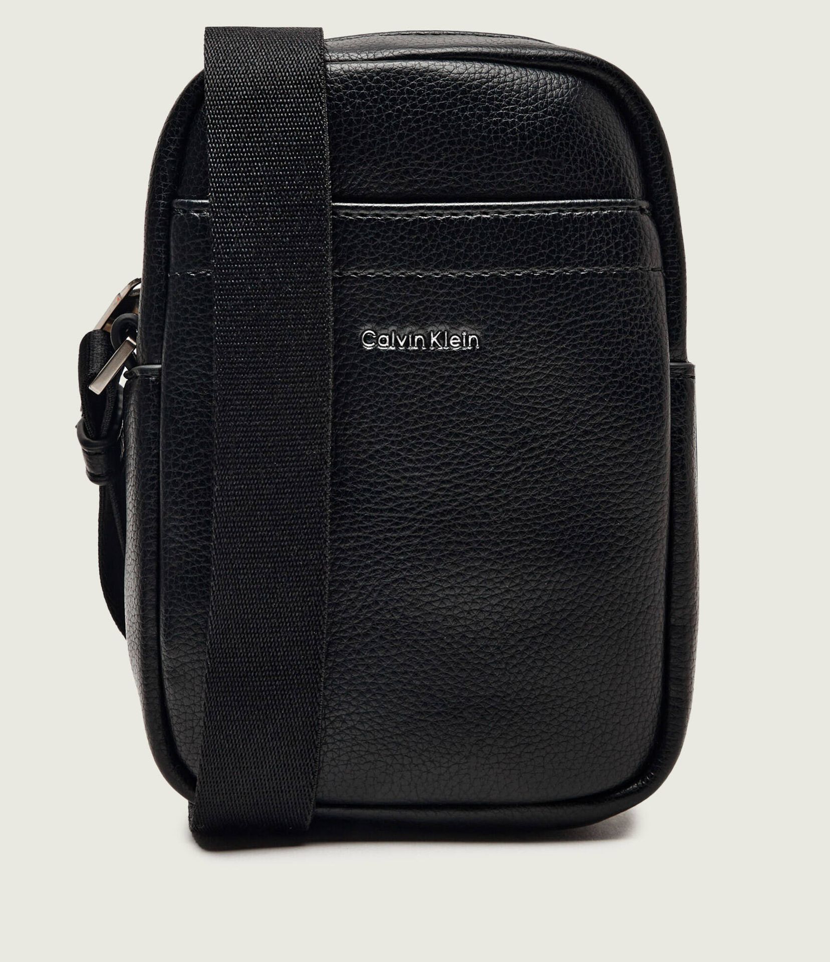 Calvin Klein Reporterka RAISED