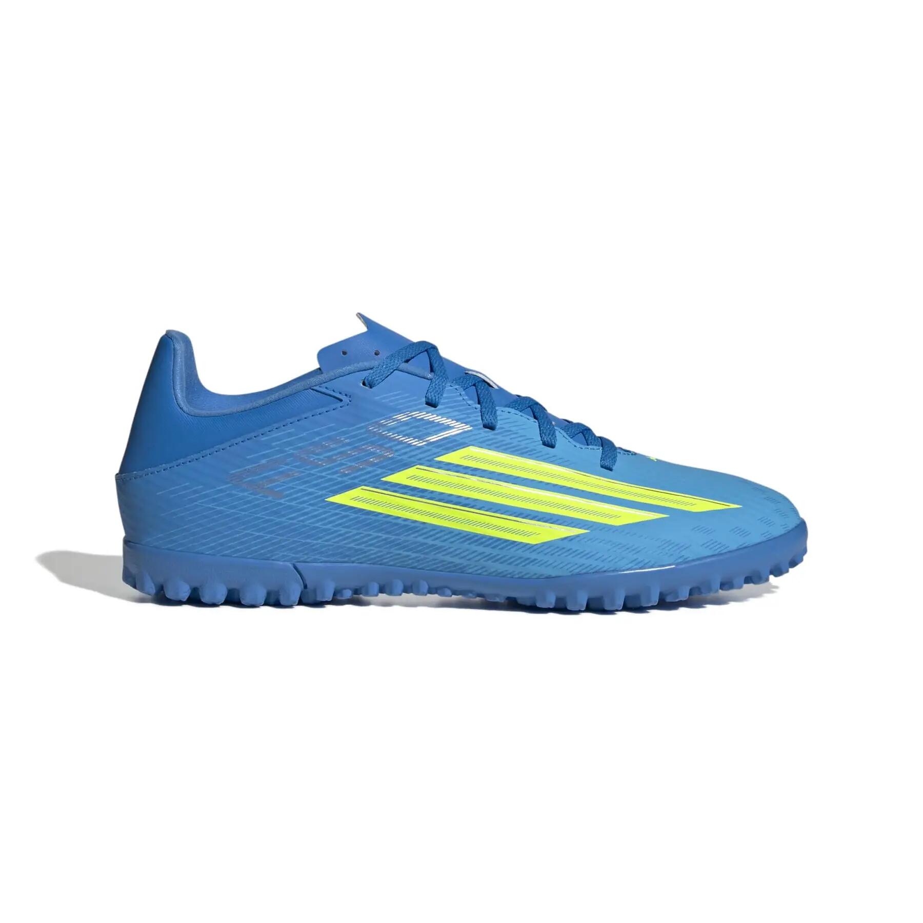 Buty piłkarskie na murawę F50 Club