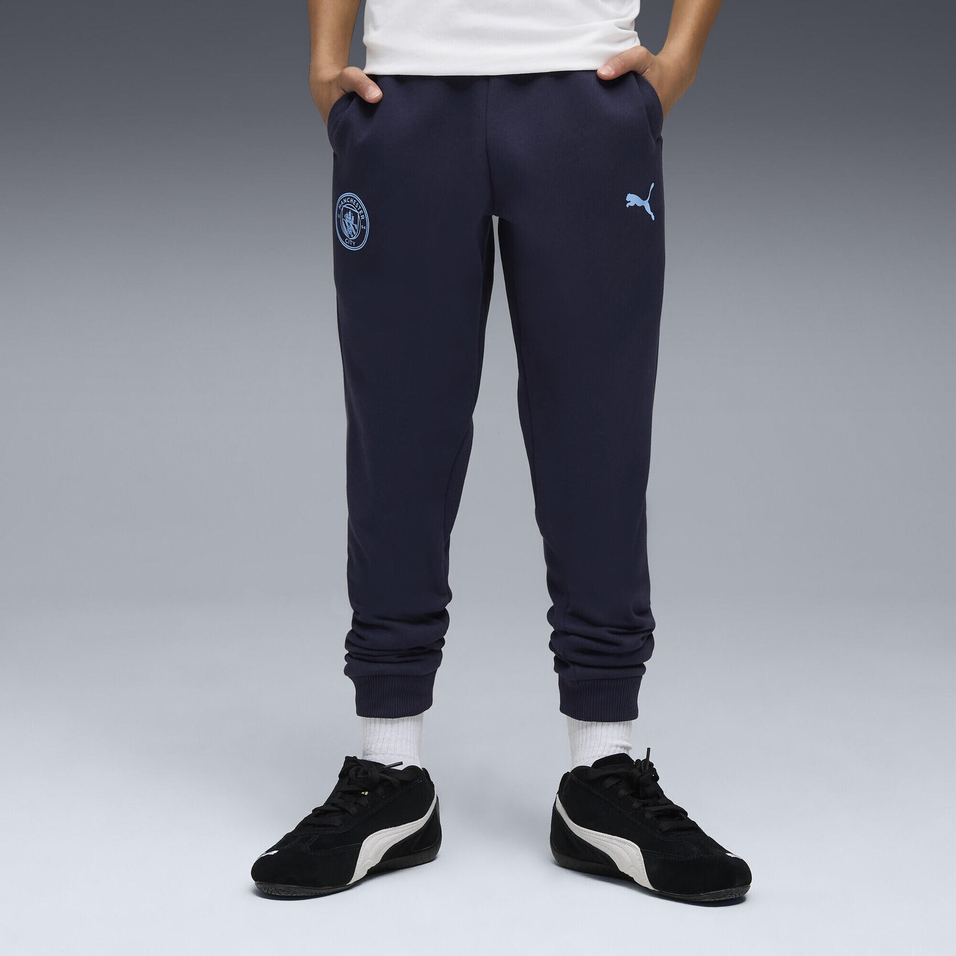 Młodzieżowe spodnie Manchester City FtblEssentials PUMA