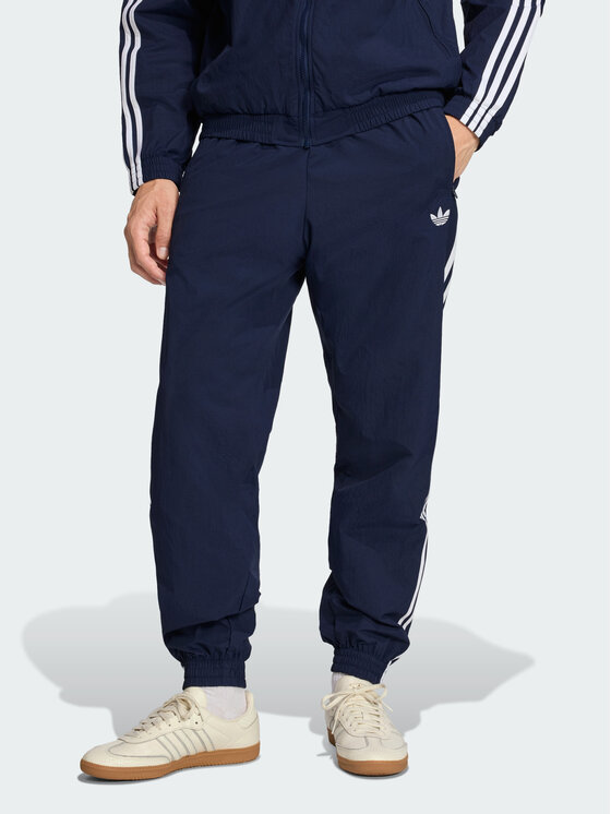 adidas Spodnie dresowe FIREBIRD WOVEN Błękitny Regular Fit