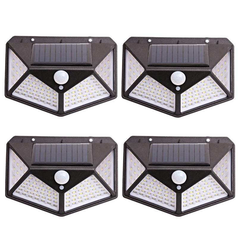 Zestaw 4 zewnętrznych lamp solarnych z czujnikiem ruchu, idealnych do oświetlenia zewnętrznego i dekoracji ogrodu.