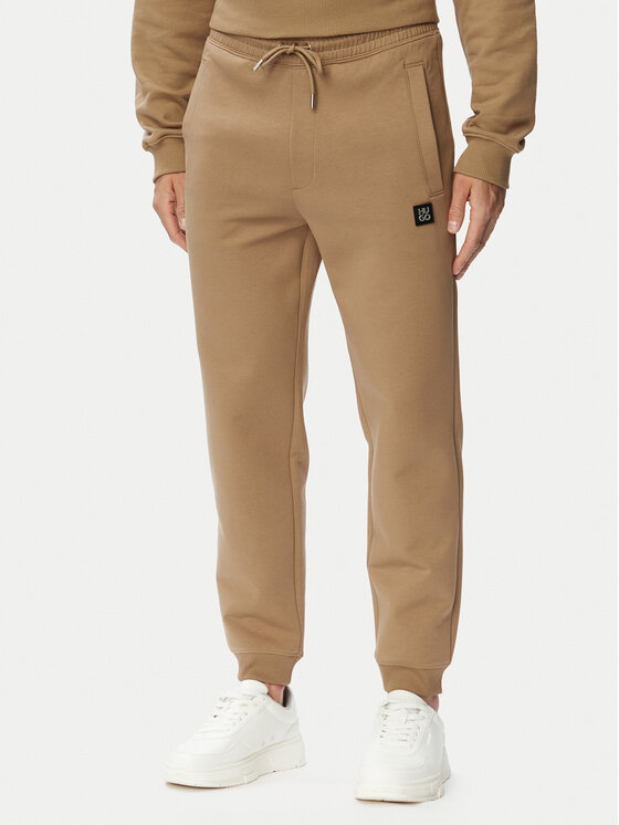 HUGO Spodnie dresowe Dimacs 50533695 Beżowy Relaxed Fit
