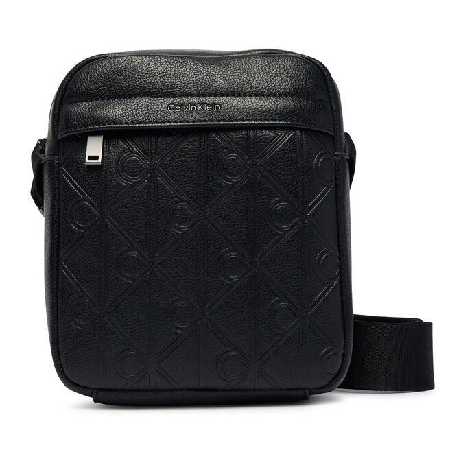 Saszetka Calvin Klein Emblem Aop Deboss Reporter LV04D3562G Czarny