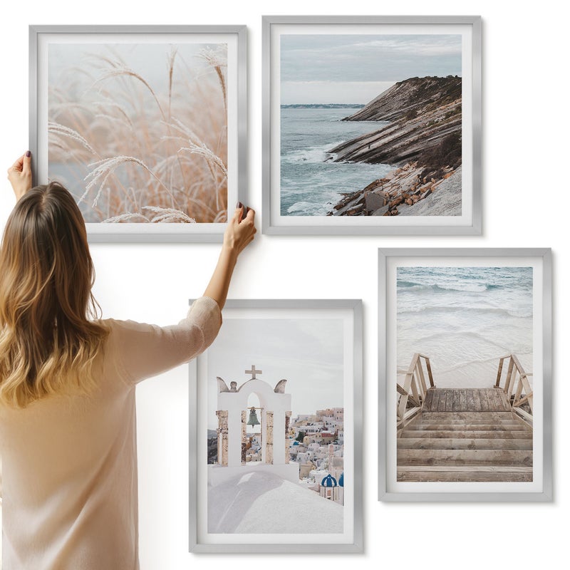 Galeria ścienna 4-częściowy komplet obrazów w srebrnych ramach - Widoki morza i architektury Santorini na tle nieba - ArtPrintCave