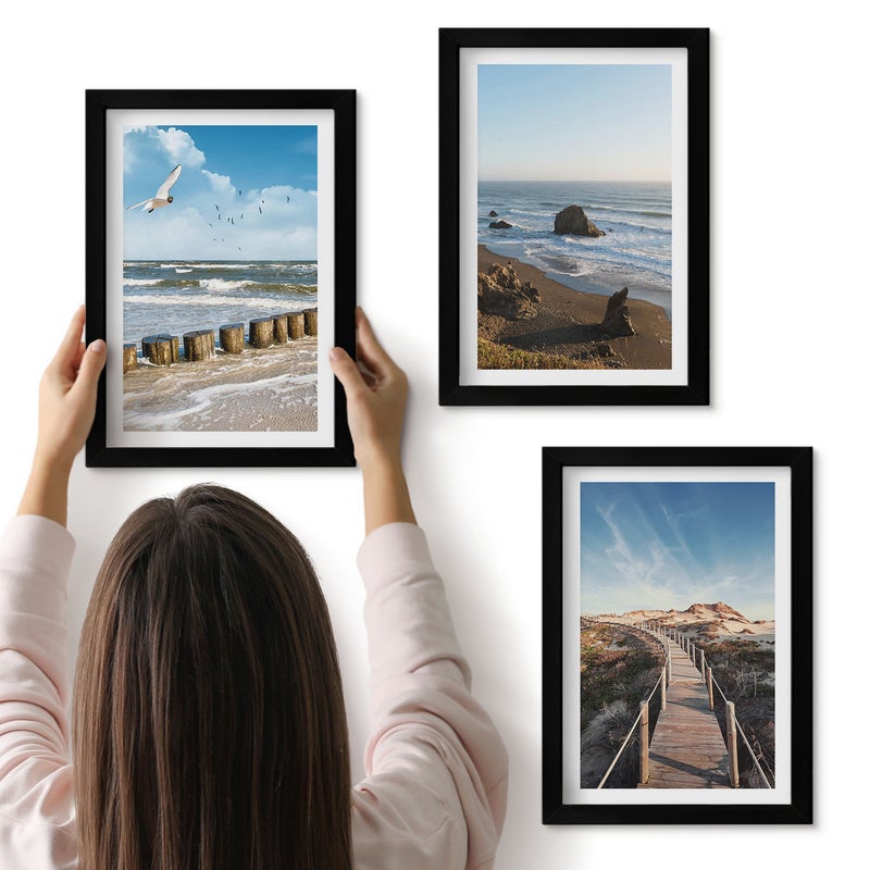 Galeria ścienna 3-częściowy komplet obrazów w czarnych ramach - Widok plaży z falami niebem i molo spacerowym - ArtPrintCave