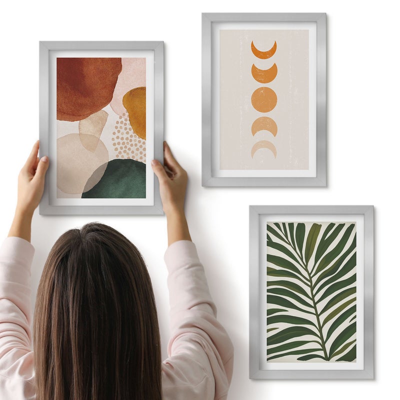 Galeria ścienna 3-częściowy komplet obrazów w srebrnych ramach - Abstrakcyjne kształty w ciepłych kolorach i liście - ArtPrintCave