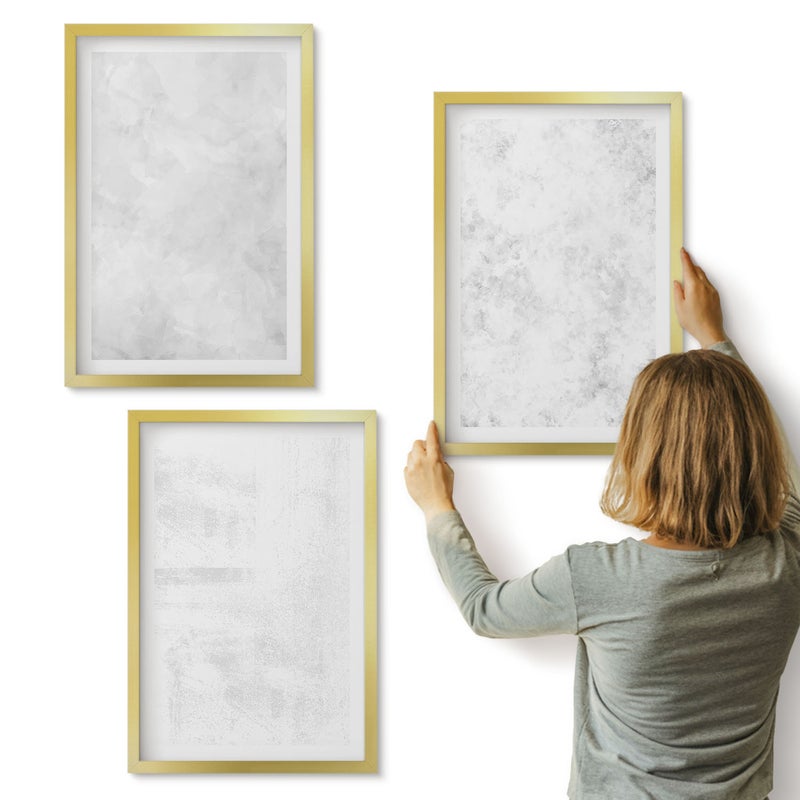 Galeria ścienna 3-częściowy komplet obrazów w złotych ramach - Białe plamy na płótnie minimalistyczne tła - ArtPrintCave