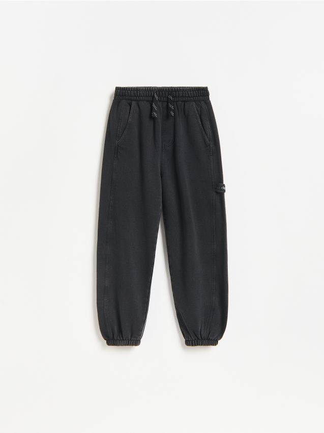 Reserved - Joggery baggy z efektem sprania - czarny