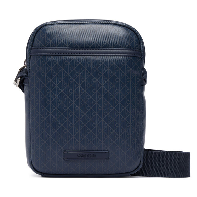 Saszetka Calvin Klein Emblem Aop Coated Slim Reporter LV04D3334G Granatowy