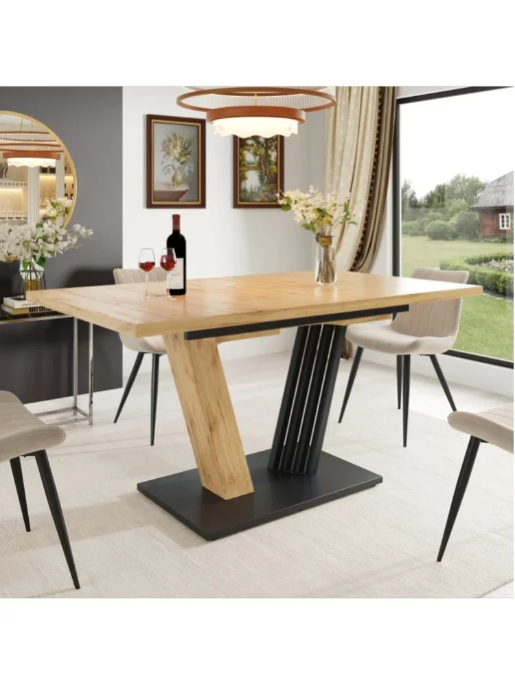 Rozkładany stół do jadalni 120-160 x 80 x 76 cm z blatem z MDF o efekcie drewna i metalowymi nogami w kształcie skrzydeł.