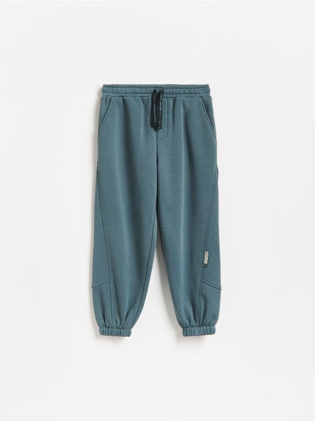 Reserved - Joggery baggy z bawełną - ciemny turkus