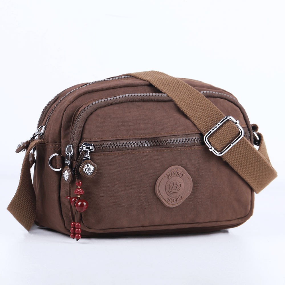 TEMU Elegancka, wytrzymała i lekka damska torba crossbody z zawieszką, stylowa, antykradzieżowa, wieeszeniowa torba unisex crossbody, elegancka,