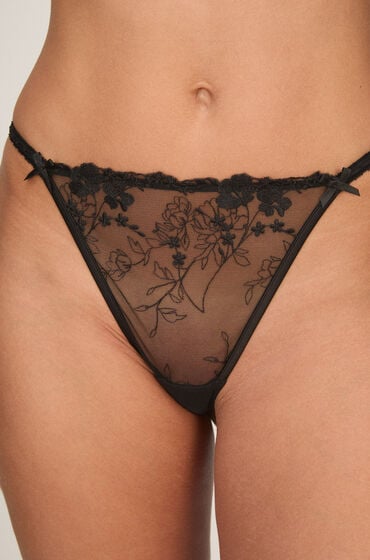 Hunkemöller Stringi z wysokim wycięciem Peonie Czarny