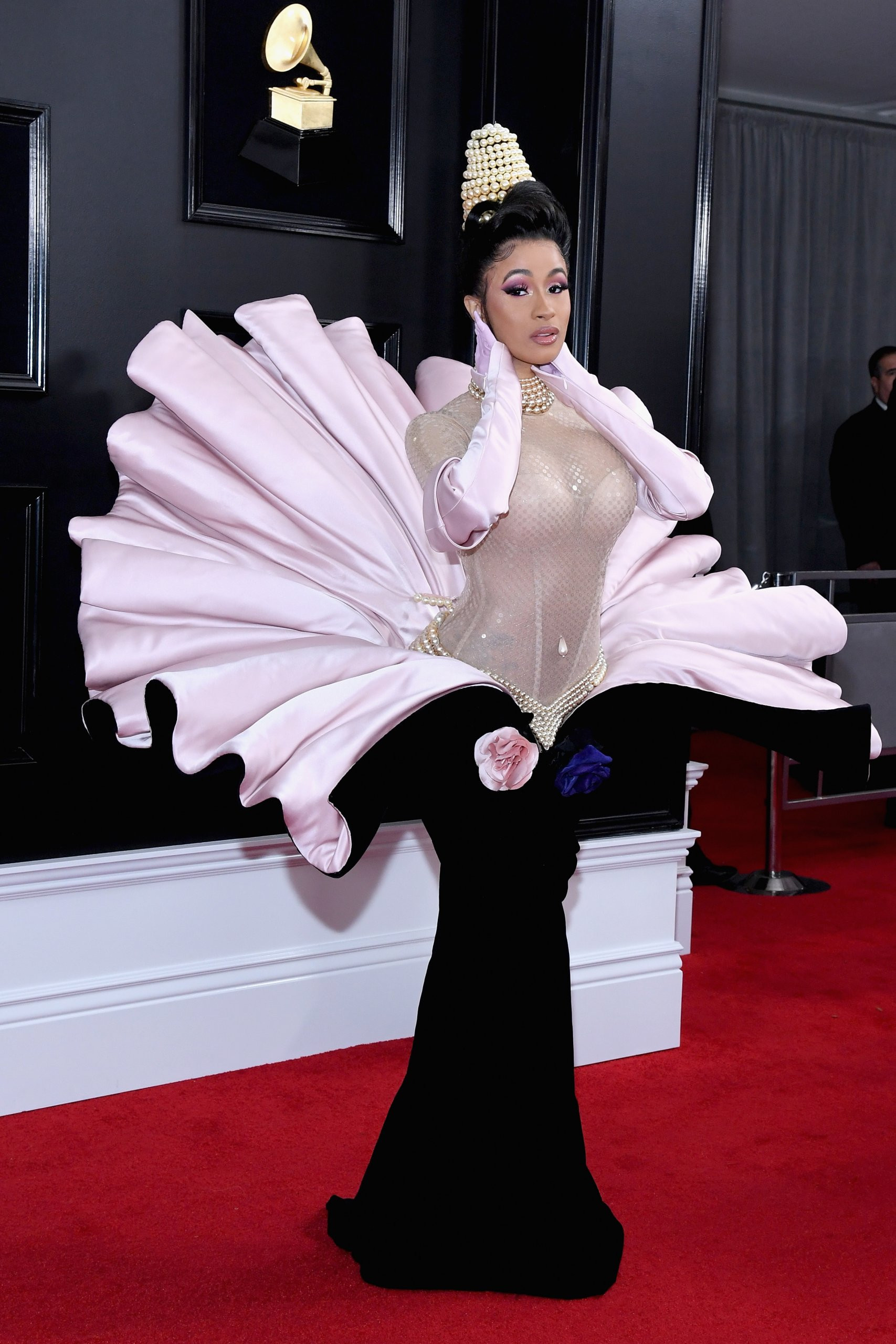 Cardi B turned up to the Grammys in a pearladorned dress that made her