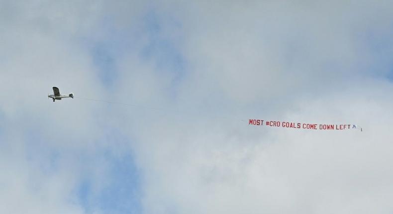 A light plane flies over England's training session on Saturday with a suggestion on Croatia tactics Creator: JUSTIN TALLIS