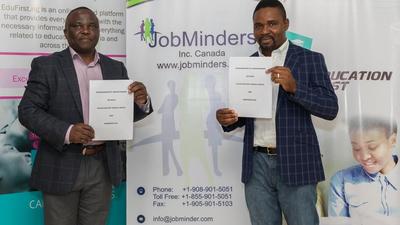 L-r: Vice President, Business Development at JobMinders, Charles Osazuwa, and Co-Founder and CEO, EduFirst.ng, displaying the agreement signed on Thursday at Skool Media office in Lagos
