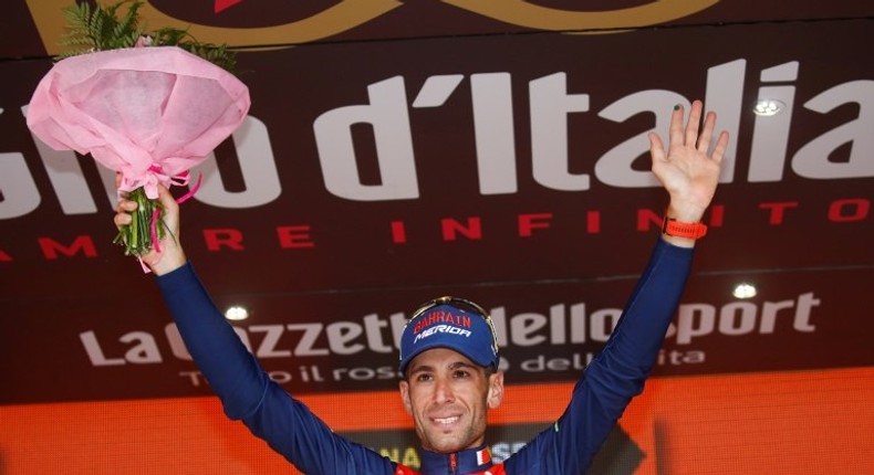 Italy's rider of team Bahrain - Merida Vincenzo Nibali celebrates on the podium after winning the 16th stage of the 100th Giro d'Italia, Tour of Italy, cycling race from Rovetta to Bormio on May 23, 2017