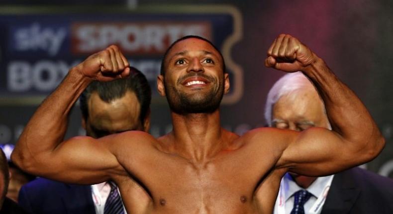 Britain's Kell Brook poses during the weigh-in for his middleweight fight against Gennady Golovkin of Kazakhstan in London, on September 9, 2016