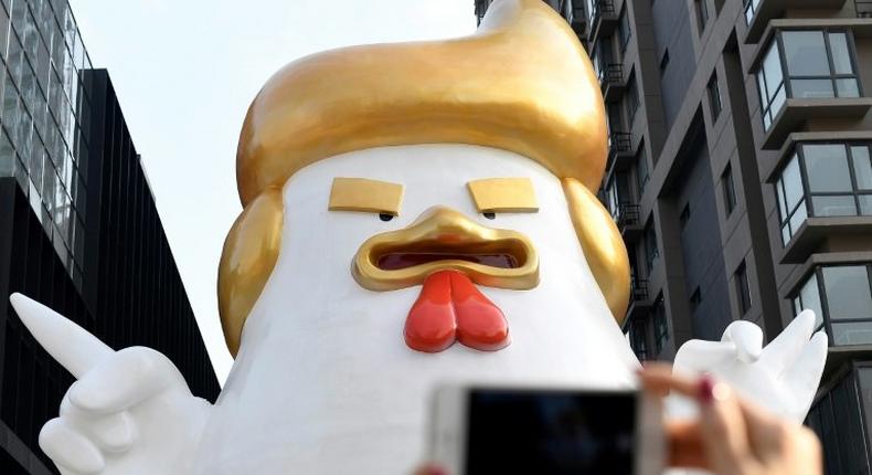 The giant chicken sculpture is placed outside a shopping mall in Taiyuan, Shanxi province