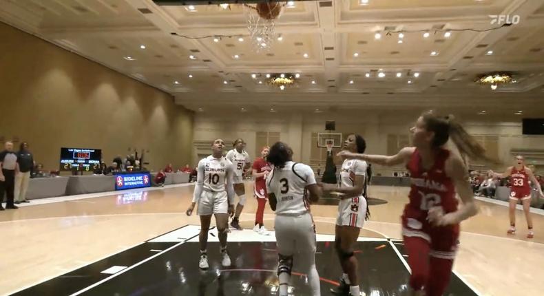 A Las Vegas Invitational game between the Indiana Hoosiers and Auburn Tigers was played in a hotel ballroom.FloHoops; Indiana Women's Basketball/Twitter