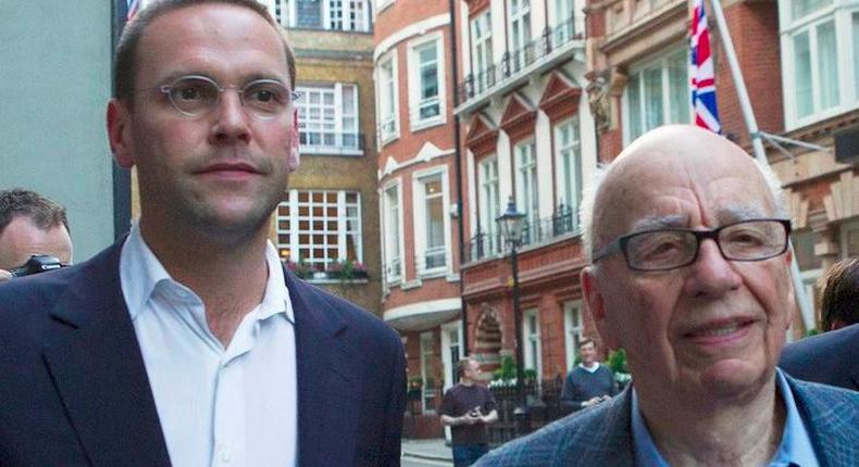 File photograph shows News International Chairman, James Murdoch and his father Rupert, leaving the Stafford Hotel in central London