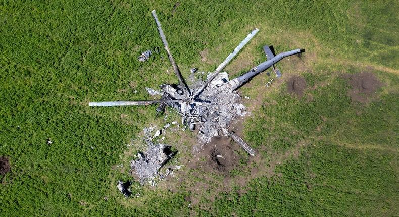 The remains of a Russian helicopter in a field east of Kharkiv, May 16, 2022.