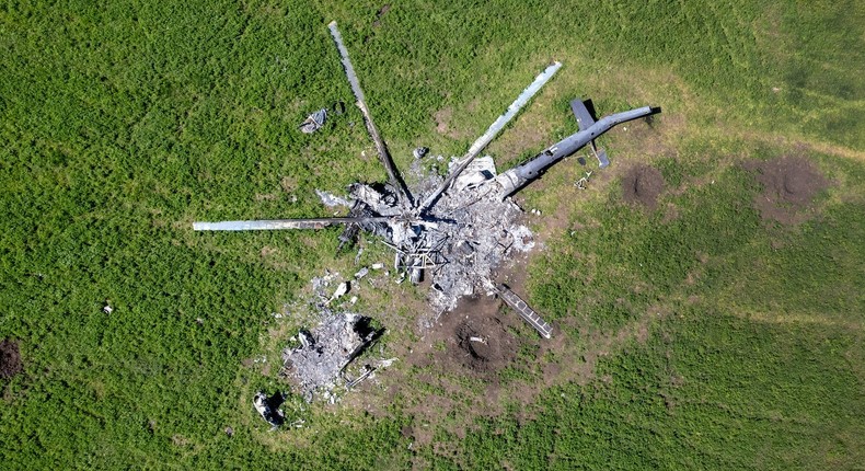 The remains of a Russian helicopter in a field east of Kharkiv, May 16, 2022.