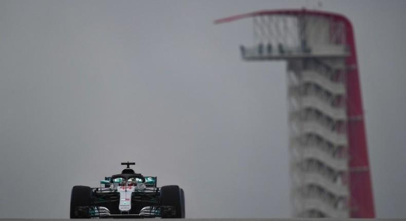 On top: Lewis Hamilton in practice on Friday