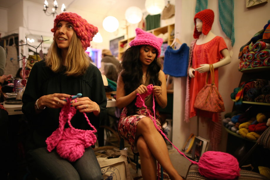 Jayna Zweiman and Krista Suh take part in the Pussyhat social media campaign they created to provide pink hats for protesters in the Women's March on Washington.