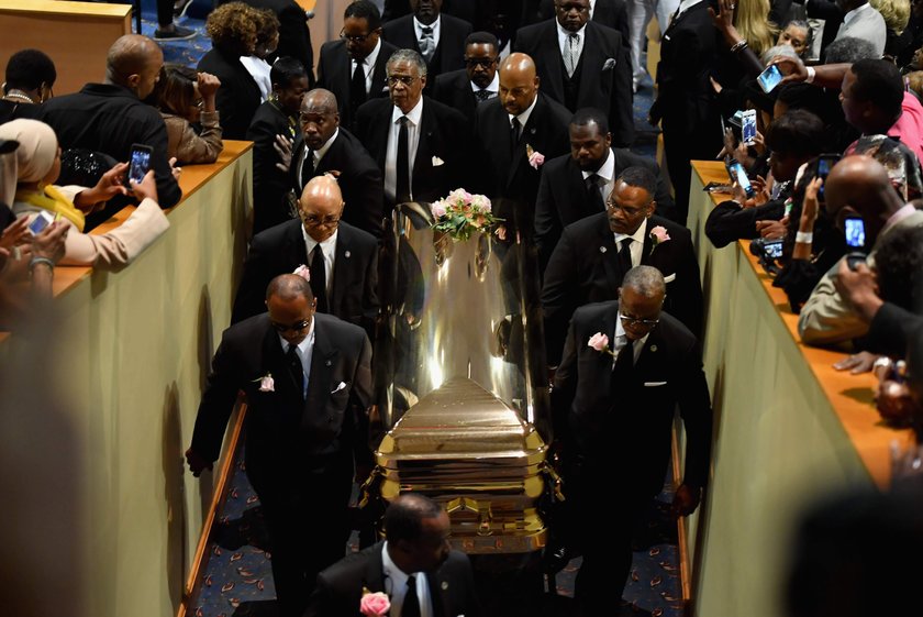 Flowers are seen on the casket of the late singer Aretha Franklin as it is laid to rest at her buria