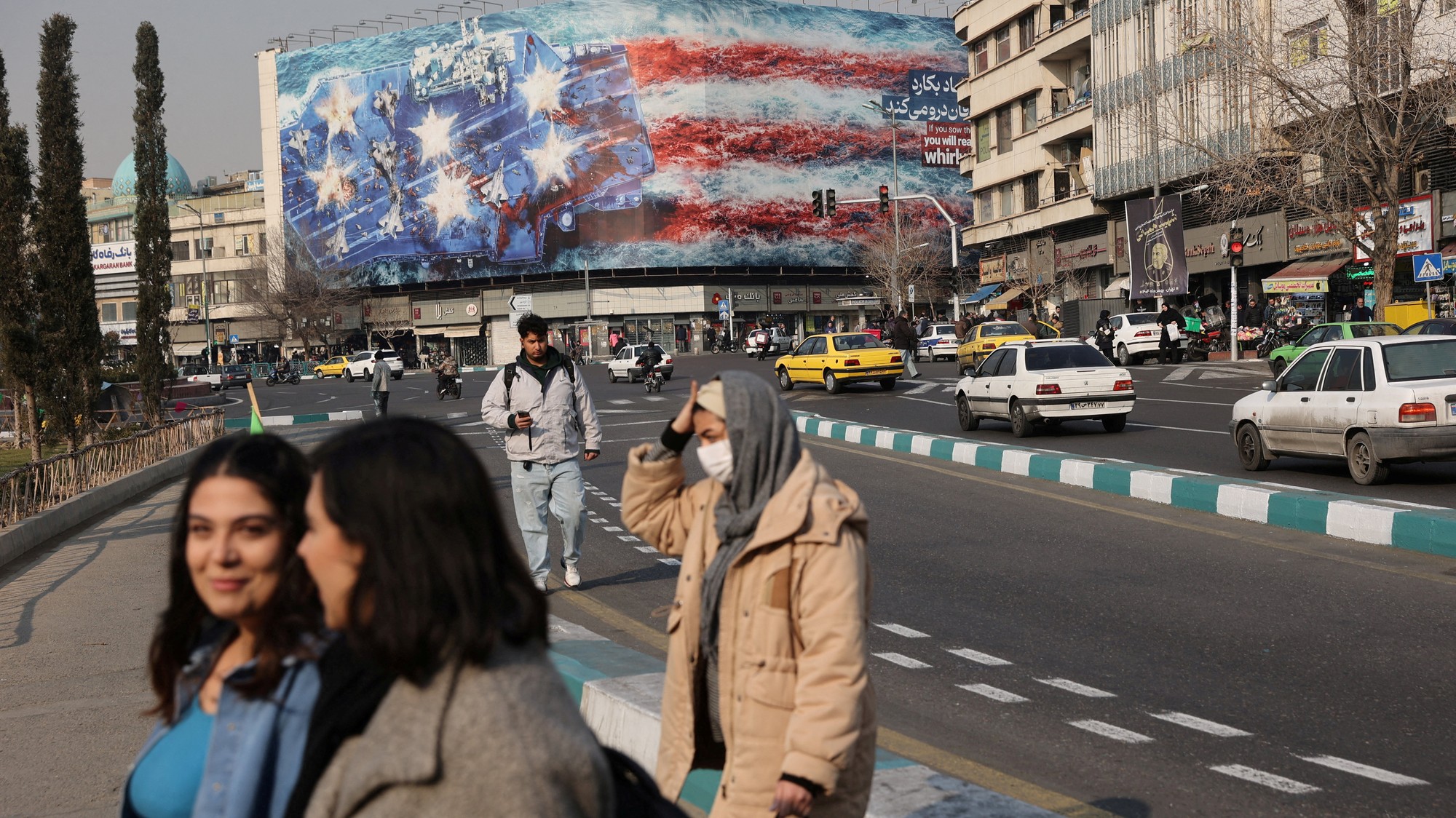 Anti-americký billboard v Iráne.