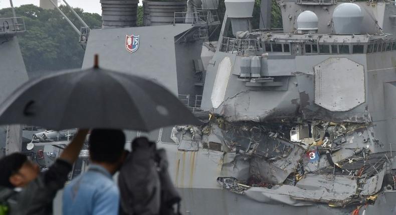 Water gushed into the destroyer after the accident left a large tear in its side