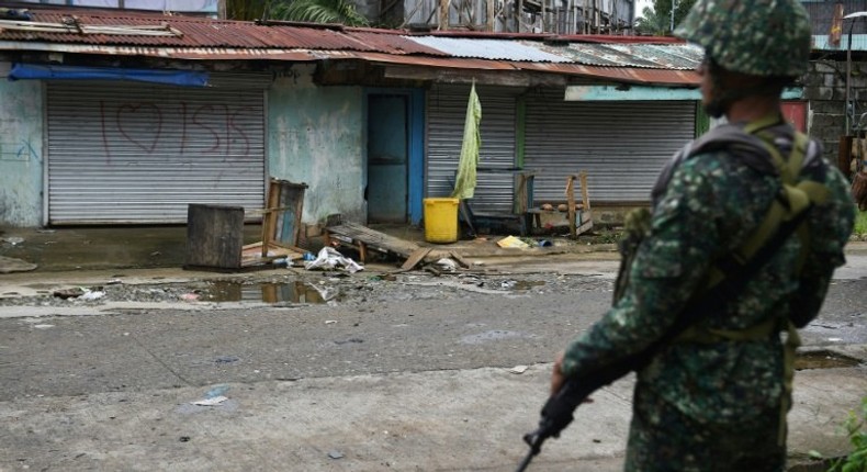 A faction of Abu Sayyaf has pledged allegiance to the Islamic State group, with members among militants who have been occupying parts of Marawi