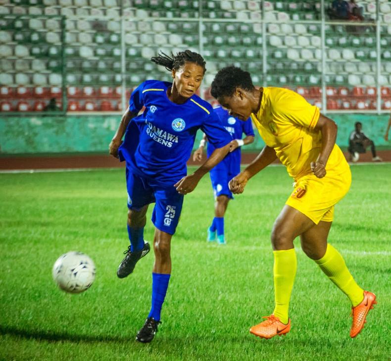 Adamawa queen player fights with Edo Queens player for the ball