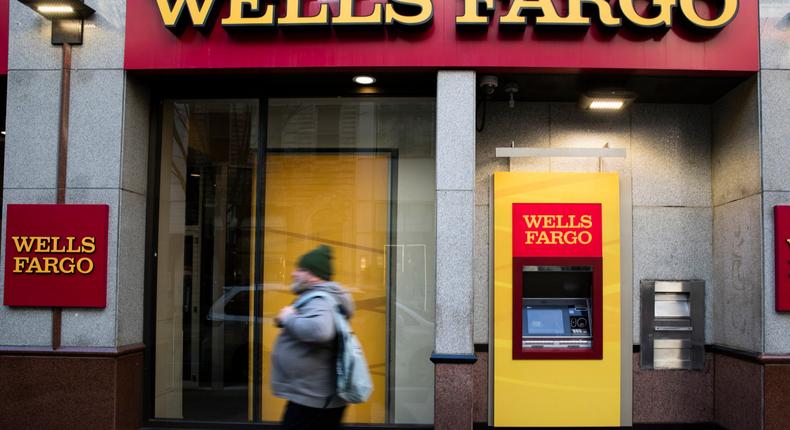 FILE- This Nov. 29, 2018, file photo shows a Wells Fargo bank location in Philadelphia. Wells Fargo customers are experiencing issues with accessing online or mobile banking as well as other banking services, after a fire happened at one of the banks data centers. (AP Photo/Matt Rourke, File)