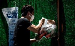 Życie w imię strategii "Zero Covid". Szanghaj szykuje się do wyjścia z lockdownu