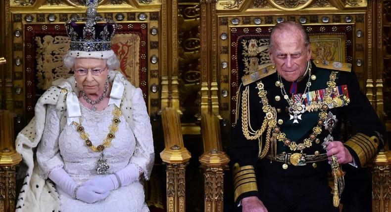 Britain's Queen Elizabeth II sits next to Prince Philip during the 2015 State Opening of Parliament at the Palace of Westminster in London